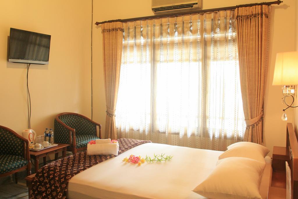 D Ajenk Boutique Guesthouse Kejayan Phòng bức ảnh